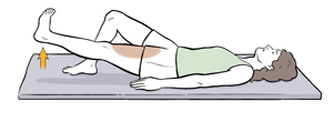 Woman lying on back doing straight leg raises.