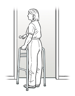 Woman with walker pushing door open preparing to walk through.