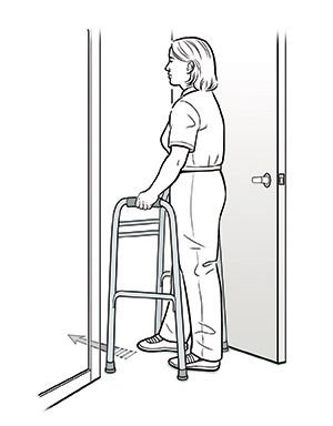 Woman with walker moving through doorway. 